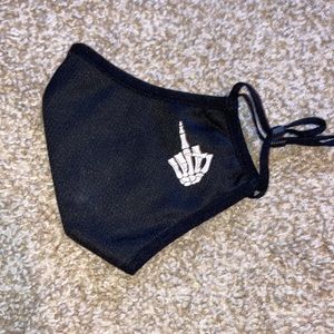 Never worn black face mask with skeleton hand